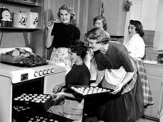 Women baking and eating cookies, 1954. Loc. no. GT2.51 p20