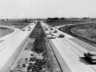 Looking south into Bloomington on I-35W at grade separation of I-35W and 78th Street, Richfield, Minnesota, Hennepin County, Project I-35W, 1959.