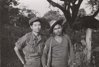 Toshio Abe (left) with Takekiro Arohi, Northern Combat Area Command, August 1944.