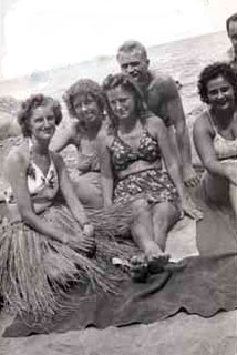 Jo Downey with friends on a beach in New Guinea, 1944.