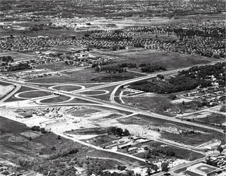 Photo: Aerial view of cloverleaf at intersection of I-35W and I-494 interchange in Bloomington, 1957.