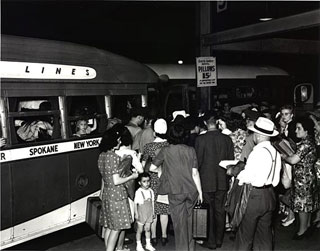 Photo: Passengers boarding bus at the bus depot, Minneapolis, 1943.