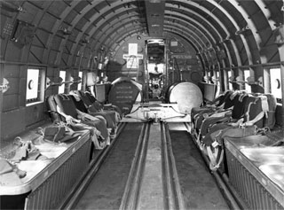 Photo: View inside the fuselage of a C-47 troop transport plane.