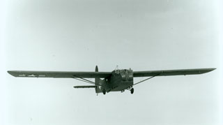 Photo: CG-4A glider in flight. The tow rope, still attached, is barely visible in this photo.