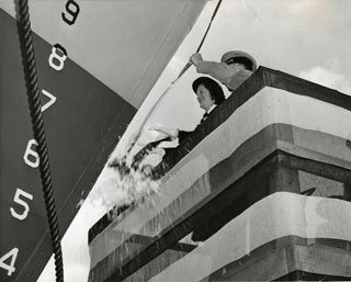 Photo: Elizabeth (B.J.) Hughs Gersey, christening the U.S.S. Passaconaway.