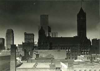 Dust storm descending on downtown Minneapolis, 1938.