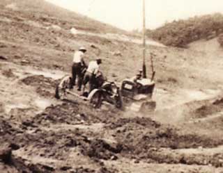 John Buskowiak driving heavy equipment, Plainview CCC Camp, 1938. 