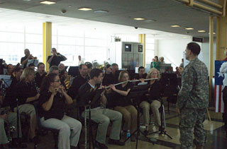 Photo: A band from Falls Church, VA welcomed Minnesota's Honor Flight veterans to Washington's Ronald Reagan National Airport.