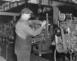 Photo: Henry Bergum assembling motors in the Ford war production plant, St. Paul.