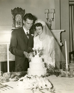 Don and Carolyn Frederick, cutting cake at their wedding reception, September 14, 1946.
