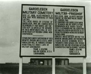 Sign erected by the 102nd Division at Gardelegen.