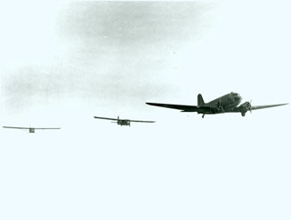 Photo: C-47 plane pulling two gliders simultaneously, ca. 1944.