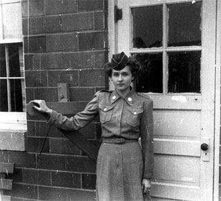 Anne Bosanko Green in winter skirt, shirt and garrison cap, Fort Des Moines, 1944.