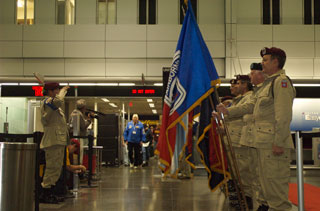 Photo: An Honor Guard was in place to greet the veterans returning home from Washington.