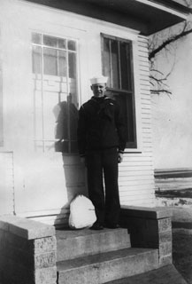 Lyman C. Irrgang home on leave from Navy boot camp, March 1941.