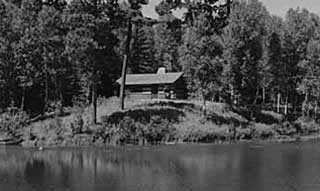 Log cabin built by Civilian Conservation Corps, Itasca State Park,
1940. 