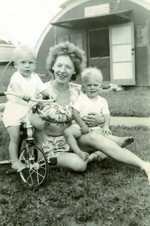 Lee Sworsky with Tony and Terry outside the family's Quonset hut, ca. 1948.