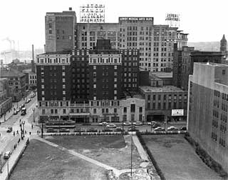 Looking west over Victory Square from Athletic Club Building to Lowry Hotel, 1949.