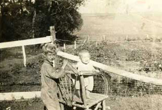 Lawrence Schaub and his brother, Westport farm, 1930s.