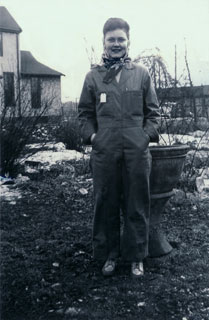 Millie Bowers decked out in worker's coveralls, ca. 1943.