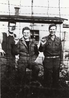 Don Frederick (left), with fellow prisoners, Moosburg POW Camp, Liberation Day, April 1945.