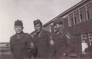 Edwin Nakasone, on left, in Japan, 1947.