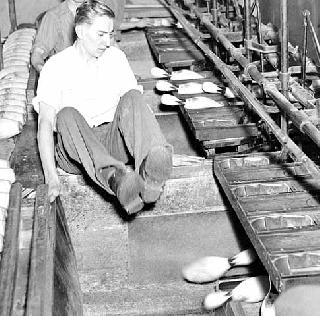 Pinsetters at work at Midway alleys, 1937.