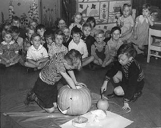 Kindergarten class carving pumpkin, Hendricks School, St. Paul, 1938.