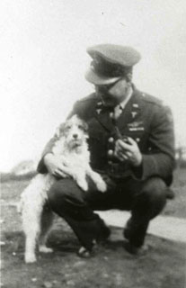 Photo: Reuben Berman with Rafni, a stray dog he adopted in Northern Ireland, 1943.