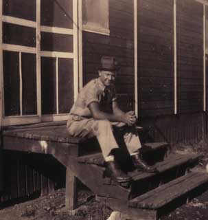 John Buskowiak near barracks, CCC Camp 2709, Plainview, ca. 1938.