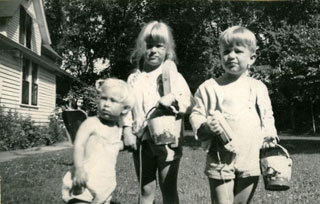 Photo: Mary, Sally and Tom Day, armed with sand pails, are ready for a trip to the beach, ca. 1949.