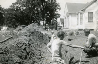 Digging a drain field in the Maxson's yard, Richfield, 1944.