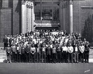 Signal Corps standing in front of entrance, Dunwoody Institute, Minneapolis, 1943.