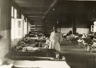 View of typhus ward in U.S. Army controlled hospital at Dachau, 1945.