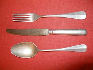 Aluminum eating utensils used by Donald S. Frederick while a POW in Germany.