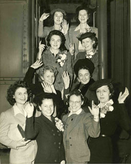 Photo: B.J. Gersey (at top, right) with other WAVES enlistees boarding a train for Madison and the Naval Radio School, 1942.